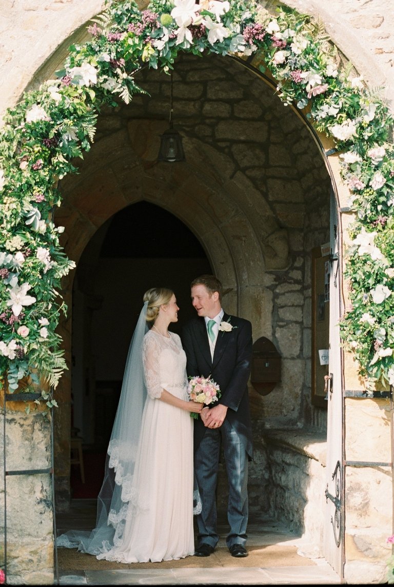 couple in church doorway