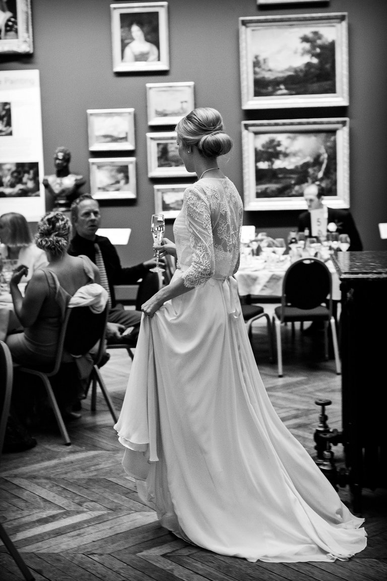 bride walking through reception
